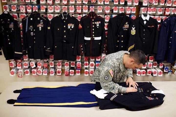 Shot of Marine Preparing Bodies for Burial