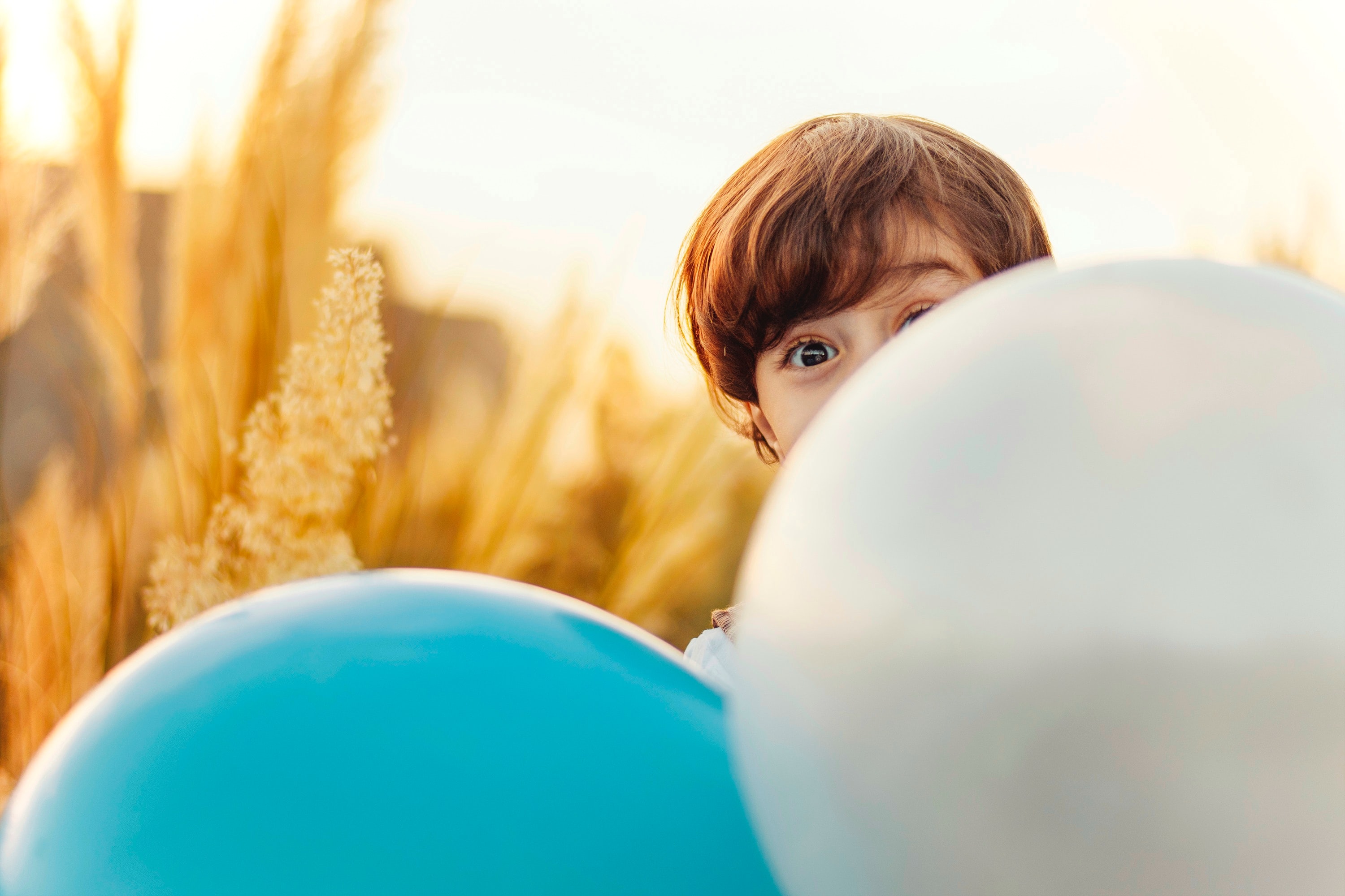 Photo of 5-year-old boy and balloons